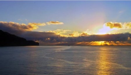 دانلود فوتیج تایم لپس طلوع خورشید بر فراز اقیانوس زیبا