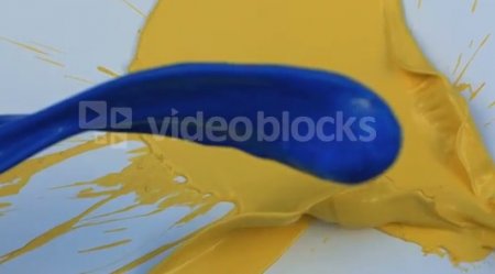 دانلود فوتیج اسلو موشن پاشیدن رنگ زرد و آبی